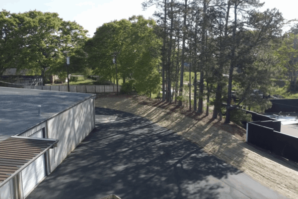 Aerial drone view of the completed Xytel Corporation industrial facility in Roebuck, SC, showcasing sitework including demolition, grading, utilities, stormwater systems, erosion control, and paving by S3 Construction