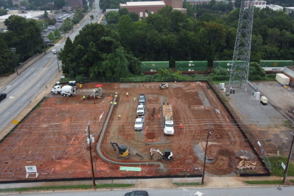In-progress sitework at Fidelity Bank in Spartanburg, SC, including grading, erosion control, utilities, and paving by S3 Construction for a new 5,528 sq. ft. facility