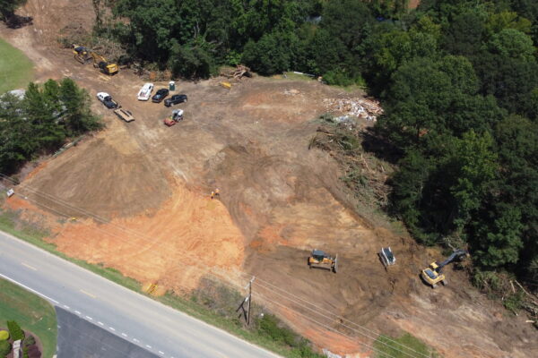 In-progress sitework at Lamb Farm residential community in Duncan, SC, with grading, utilities, and infrastructure preparation for 110 single-family homes by S3 Construction