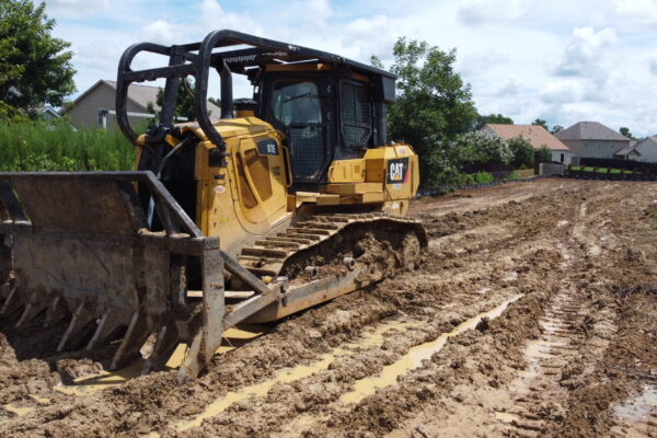 In-progress sitework at Lamb Farm residential community in Duncan, SC, with grading, utilities, and infrastructure preparation for 110 single-family homes by S3 Construction