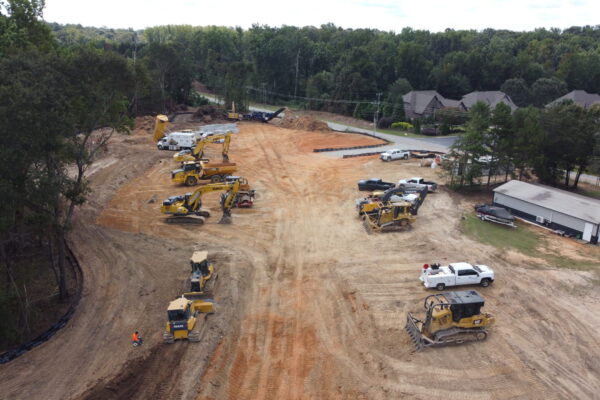 In-progress sitework at Lamb Farm residential community in Duncan, SC, with grading, utilities, and infrastructure preparation for 110 single-family homes by S3 Construction