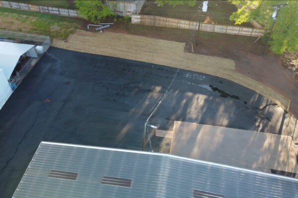 Aerial drone view of the completed Xytel Corporation industrial facility in Roebuck, SC, showcasing sitework including demolition, grading, utilities, stormwater systems, erosion control, and paving by S3 Construction