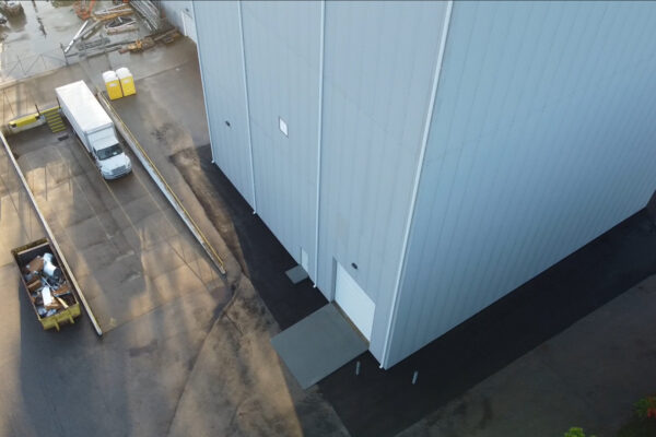 Aerial drone view of the completed Xytel Corporation industrial facility in Roebuck, SC, showcasing sitework including demolition, grading, utilities, stormwater systems, erosion control, and paving by S3 Construction